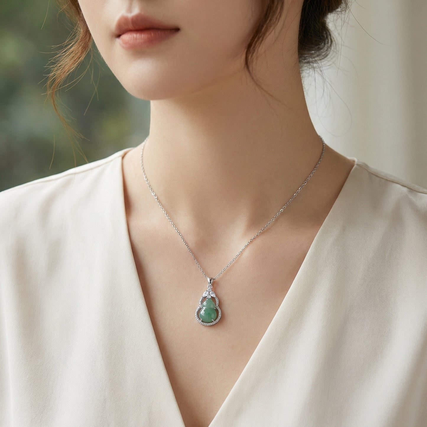 925 Sterling Silver Elegant Green Jadeite Hulu Gourd Pendant Necklace with Shimmering Stone Accents