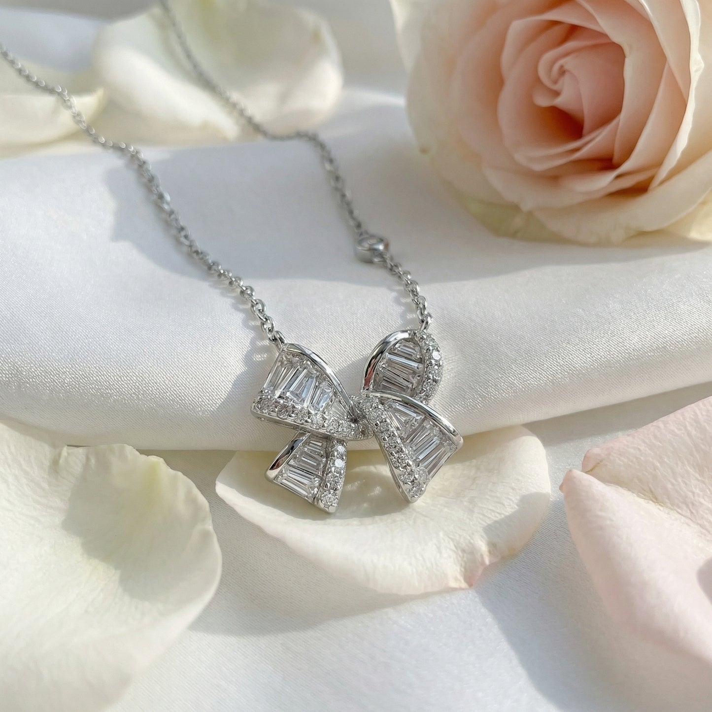925 Sterling Silver Elegant Baguette and Round Diamond Ribbon Bow Pendant Necklace