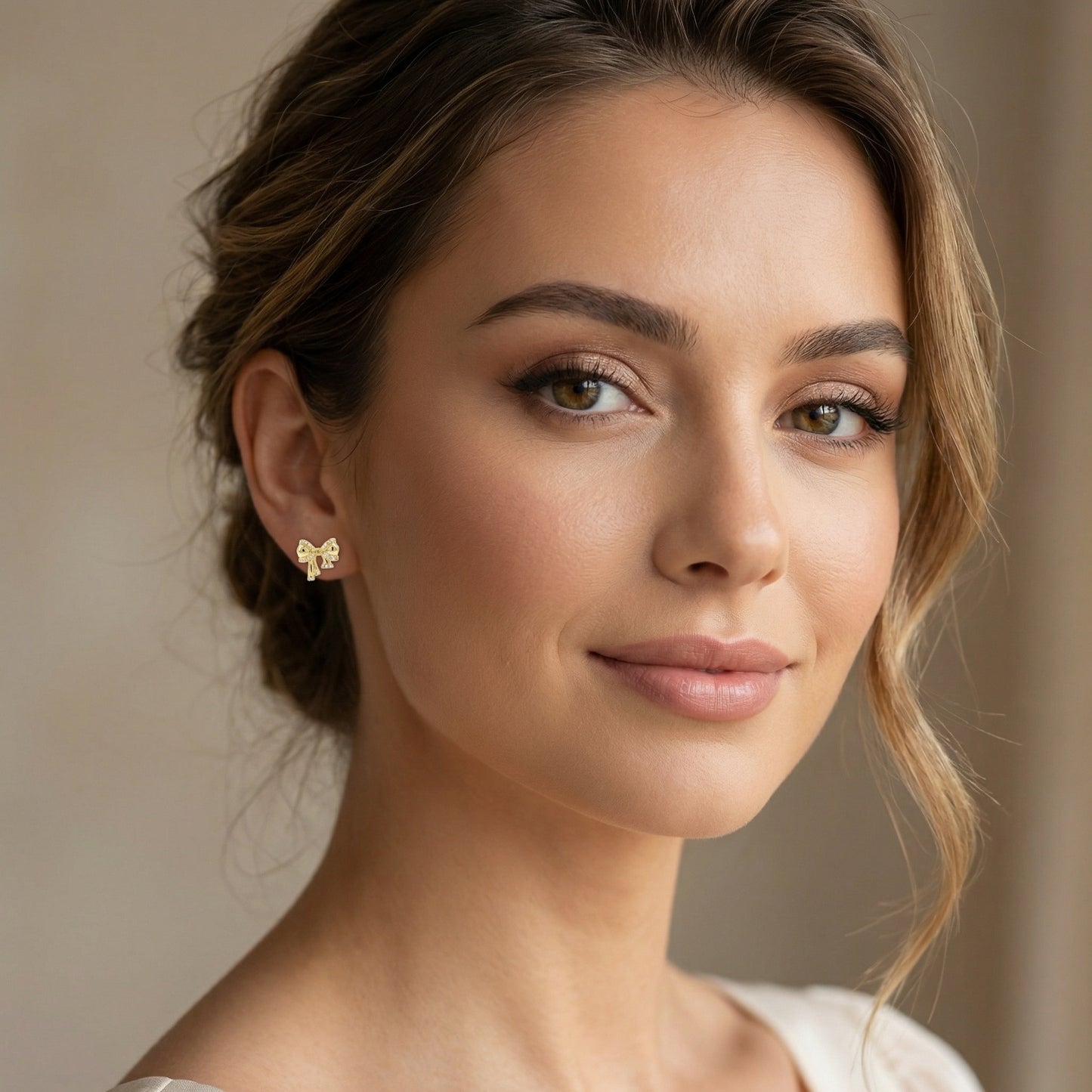 925 Sterling Silver Shimmering Ribbon Bow Stud Earrings with Radiant Clear Stone Embellishments